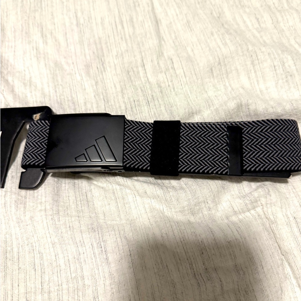 Adidas golf belt. NWOT.